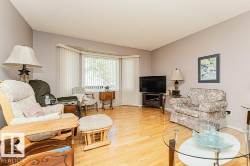 3242 38 Avenue, Edmonton, AB - Indoor Photo Showing Living Room