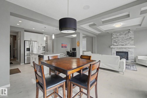 2233 56 Street, Edmonton, AB - Indoor Photo Showing Other Room With Fireplace