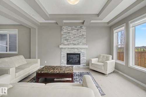 2233 56 Street, Edmonton, AB - Indoor Photo Showing Living Room With Fireplace