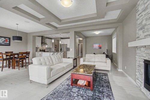 2233 56 Street, Edmonton, AB - Indoor Photo Showing Living Room With Fireplace
