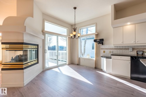 189 Blackburn Drive W, Edmonton, AB - Indoor Photo Showing Kitchen With Fireplace