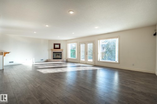 189 Blackburn Drive W, Edmonton, AB - Indoor Photo Showing Living Room With Fireplace