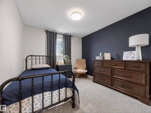 7211 78 Ave, Edmonton, AB - Indoor Photo Showing Bedroom