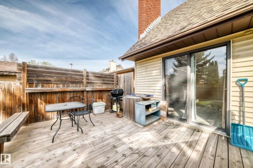 Spacious wood-plank deck with a wood privacy fence - 9528 189 Street, Edmonton, AB - Outdoor With Deck Patio Veranda With Exterior