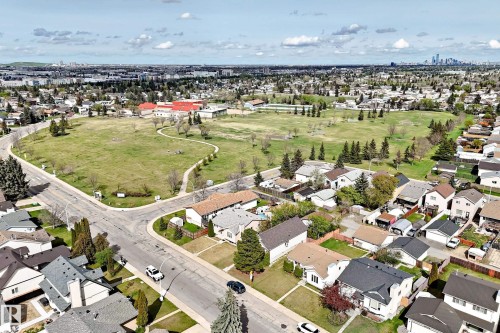 Expansive green space and residential rooftops captured from an elevated perspective - 9528 189 Street, Edmonton, AB - Outdoor With View