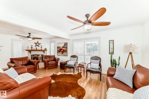 Living area featuring hardwood flooring and white walls - 11115 44 Street, Edmonton, AB - Indoor Photo Showing Living Room