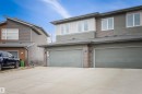 The property features modern architectural design with a blend of siding and brick accents - 607 40 Street Sw, Edmonton, AB  - Outdoor 