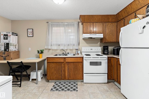 12916 69 Street, Edmonton, AB - Indoor Photo Showing Kitchen With Double Sink