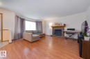 10816 67 Avenue, Edmonton, AB  - Indoor Photo Showing Living Room With Fireplace 