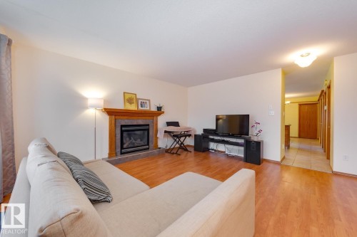 10816 67 Avenue, Edmonton, AB - Indoor Photo Showing Living Room With Fireplace