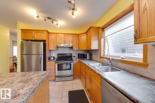 10816 67 Avenue, Edmonton, AB - Indoor Photo Showing Kitchen With Double Sink