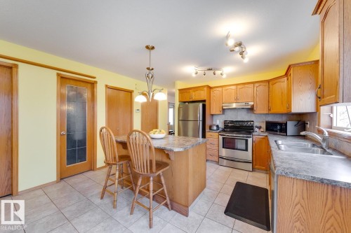 10816 67 Avenue, Edmonton, AB - Indoor Photo Showing Kitchen With Double Sink