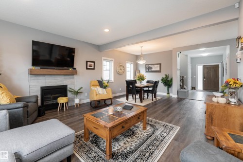 49 Wilson Close, Fort Saskatchewan, AB - Indoor Photo Showing Living Room With Fireplace