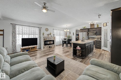 15 12604 153 Avenue, Edmonton, AB - Indoor Photo Showing Living Room With Fireplace