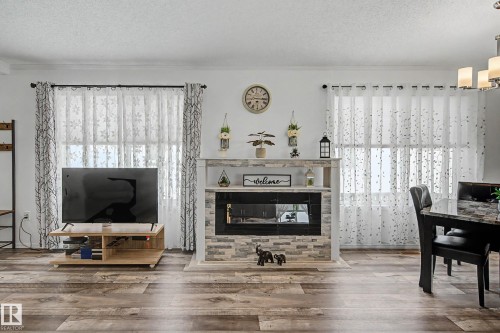 15 12604 153 Avenue, Edmonton, AB - Indoor Photo Showing Living Room With Fireplace