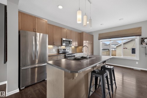 828 36 Avenue, Edmonton, AB - Indoor Photo Showing Kitchen With Double Sink