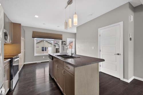 828 36 Avenue, Edmonton, AB - Indoor Photo Showing Kitchen With Double Sink
