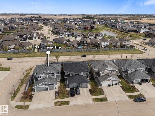 Aerial perspective highlighting a residential property within a developed neighborhood - 3 Richmond Link, Fort Saskatchewan, AB - Outdoor With View