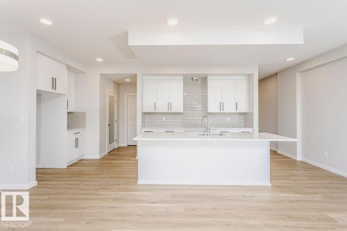 17332 5Th Street Nw, Edmonton, AB - Indoor Photo Showing Kitchen With Double Sink