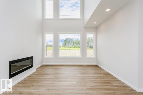 17332 5Th Street Nw, Edmonton, AB - Indoor Photo Showing Other Room With Fireplace
