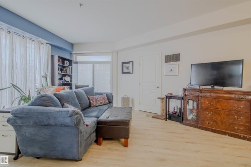 171 4823 104A Street, Edmonton, AB - Indoor Photo Showing Living Room