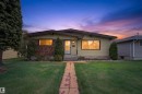 Ranch-style exterior with a brick and siding facade - 8407 150 Avenue, Edmonton, AB  - Outdoor 