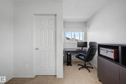 Neutral wall color with white trim and a six-panel interior door - 16211 55A Street, Edmonton, AB - Indoor