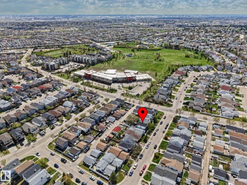 Residential area featuring single-family homes and multi-story buildings - 16211 55A Street, Edmonton, AB - Outdoor With View