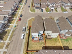 Aerial perspective showcasing a residential area with uniform housing - 