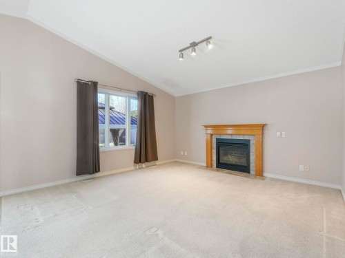 3620 130 Avenue, Edmonton, AB - Indoor Photo Showing Living Room With Fireplace