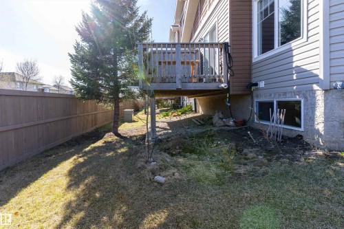 Raised wooden deck featuring a perimeter railing - 23 3103 Hilton Drive, Edmonton, AB - Outdoor With Deck Patio Veranda