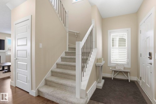 Foyer with stairs - 1915 77 Street, Edmonton, AB - Indoor Photo Showing Other Room