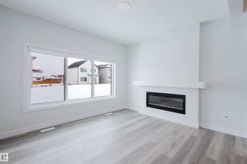 2831 191 Street, Edmonton, AB - Indoor Photo Showing Living Room With Fireplace
