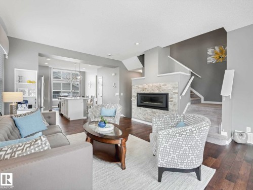 5922 Anthony Crescent Sw, Edmonton, AB - Indoor Photo Showing Living Room With Fireplace