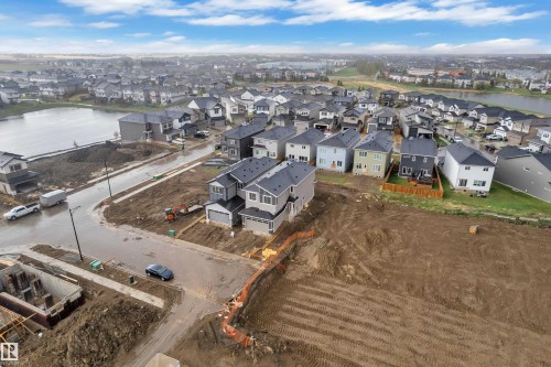 Newly constructed property featuring a two-story design with an attached double garage - 6226 45 Avenue, Beaumont, AB - Outdoor With View
