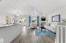 6 10848 8 Avenue, Edmonton, AB  - Indoor Photo Showing Living Room With Fireplace 