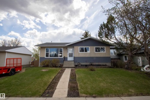 Ranch-style residence featuring a split-level design with a beige and blue exterior - 5125 46 Ave, St. Paul Town, AB - Outdoor With Facade