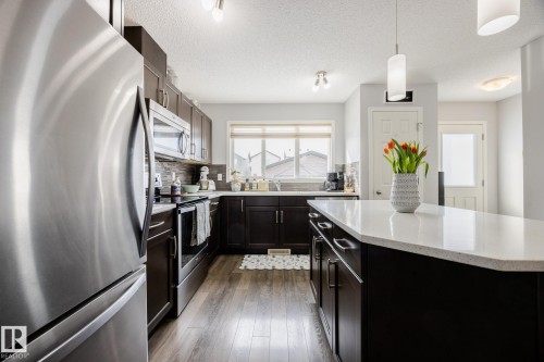 3841 Powell Wynd Sw, Edmonton, AB - Indoor Photo Showing Kitchen With Upgraded Kitchen