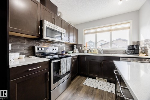 3841 Powell Wynd Sw, Edmonton, AB - Indoor Photo Showing Kitchen With Upgraded Kitchen