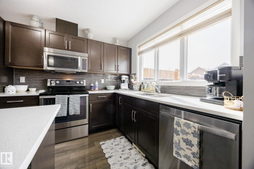 3841 Powell Wynd Sw, Edmonton, AB - Indoor Photo Showing Kitchen With Double Sink