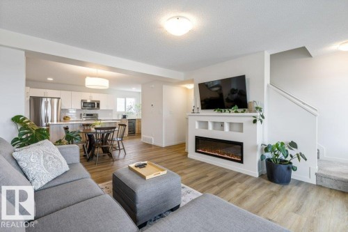 4 Jensen Gate, St. Albert, AB - Indoor Photo Showing Living Room With Fireplace