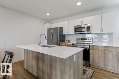 4 Jensen Gate, St. Albert, AB - Indoor Photo Showing Kitchen With Double Sink With Upgraded Kitchen