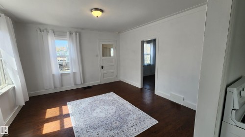 Newer flooring - 5017 51 Street, Elk Point, AB - Indoor Photo Showing Other Room