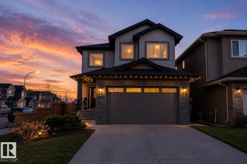 Modern two-story residence with a concrete driveway and an attached two-car garage - 6303 169 Avenue, Edmonton, AB - Outdoor
