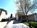 Two-story residence featuring light-colored siding and dark trim - 14125 30 Street, Edmonton, AB  - Outdoor 