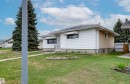 Single-story residence featuring white horizontal siding and stucco accents - 13231 74 Street, Edmonton, AB  - Outdoor 