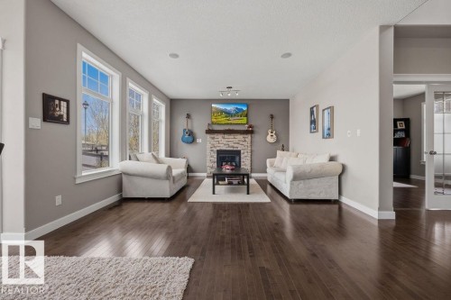 5 Krahn Court, Leduc, AB - Indoor Photo Showing Living Room With Fireplace