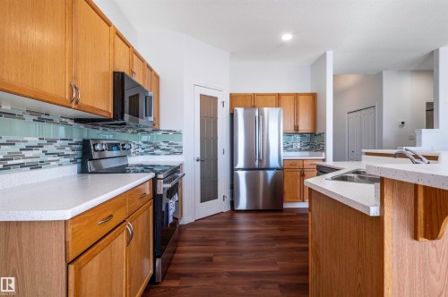 22 Stony Creek, Stony Plain, AB - Indoor Photo Showing Kitchen With Stainless Steel Kitchen With Double Sink
