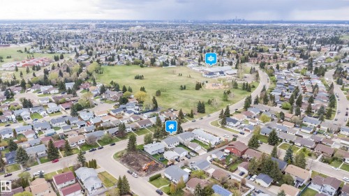 Residential neighborhood featuring a mix of mature trees and established homes - 1771 37 Street, Edmonton, AB - Outdoor With View