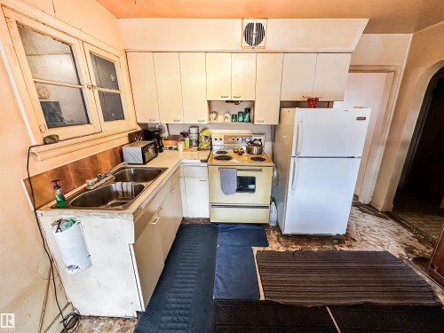 11345 93 Street, Edmonton, AB - Indoor Photo Showing Kitchen With Double Sink